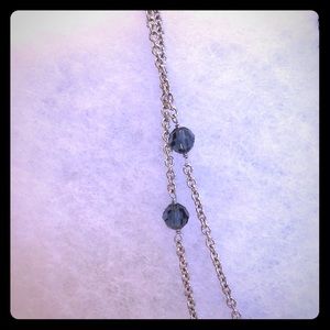 Silver Necklace 29 1/2 inches long with beads.